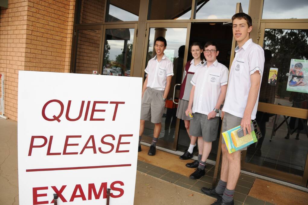 Dubbo Christian School HCS students Jiajun Zhang, Angela Albion, Ben Coady and Andy Rowlands after completing the chemistry exam. Photo: BELINDA SOOLE.