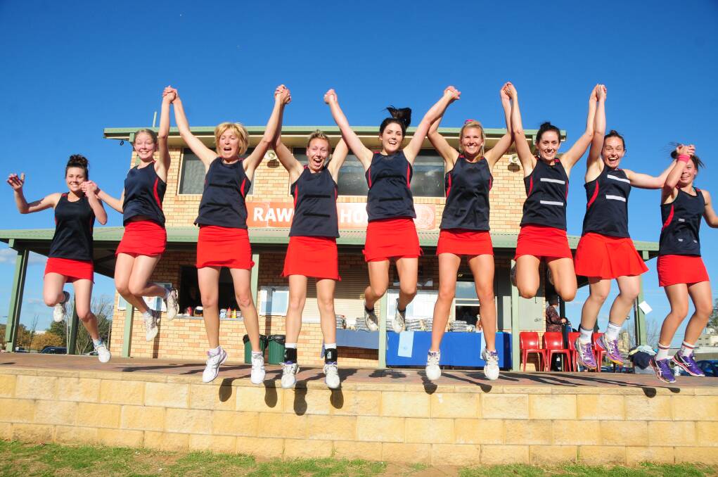 BACK-TO-BACK PREMIERSHIP TITLES: St Collegians players Laura Howell, Bri Carlow, Sonia Black, Rochelle Rope, Edwina Capell, Megan Liplyn, Emily Willmott, Michelle Williams and Grace Pilon show their delight at winning a second straight A-grade title. 											 Photo: LOUISE DONGES
