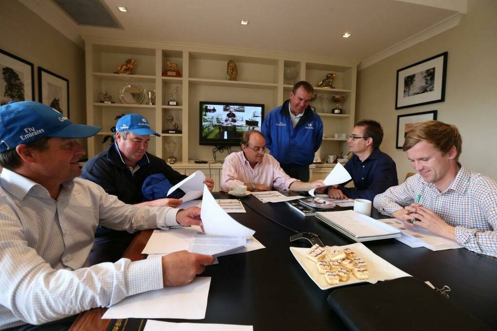 True blue: Darren Beadman, Brad Widdup, Henry Plumptre, John O’Shea, Jason Walsh and Tom Ward at the weekly planning meeting at Warwick Farm. Photo: Peter Rae