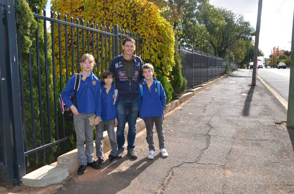 Dubbo South Public students Eva, Freya and Rory Stein with dad, David Stein, taking part in the National Walk Safely to School Day. 
 
Photos: TAYLOR JURD