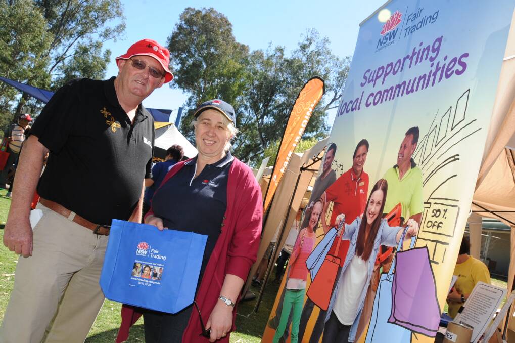 Paul Coles and Kerrie Smith from Fair Trading NSW at yesterday s Family Fun Day in Dubbo.	         Photo: BELINDA SOOLE