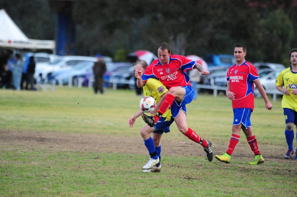 Orana Spurs' James Vaughan and South Dubbo Wanderers Tommy Josephs battle for possession during their clash last Sunday.