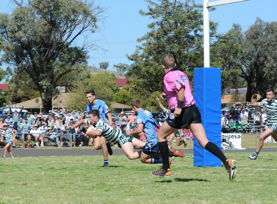 Jake Hall scores the match-winning try for Dubbo CYMS in their dramatic win over Macquarie in Sunday's under-18s preliminary final.  Photo: BELINDA SOOLE