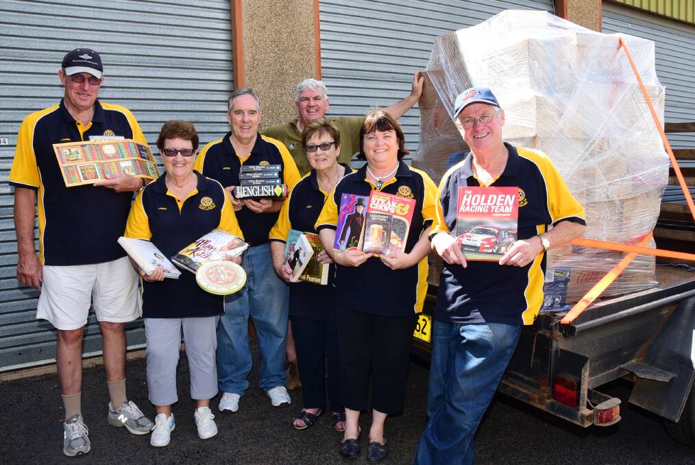 Dubbo Macquarie Rotary Club members Lawrie Donoghue, Lorna Breeze, Peter Bartley, Peter English, Judy Jakins, Lorraine Croft and Peter Croft were busy sorting through books for the Michael Egan Memorial Book Fair on Saturday. 			 Photo: BROOK KELLEHEAR-SMITH