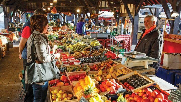 Cruise passengers check out  a market while on a Scenic Tours cruise in France.
 Photo: Scenic Tours