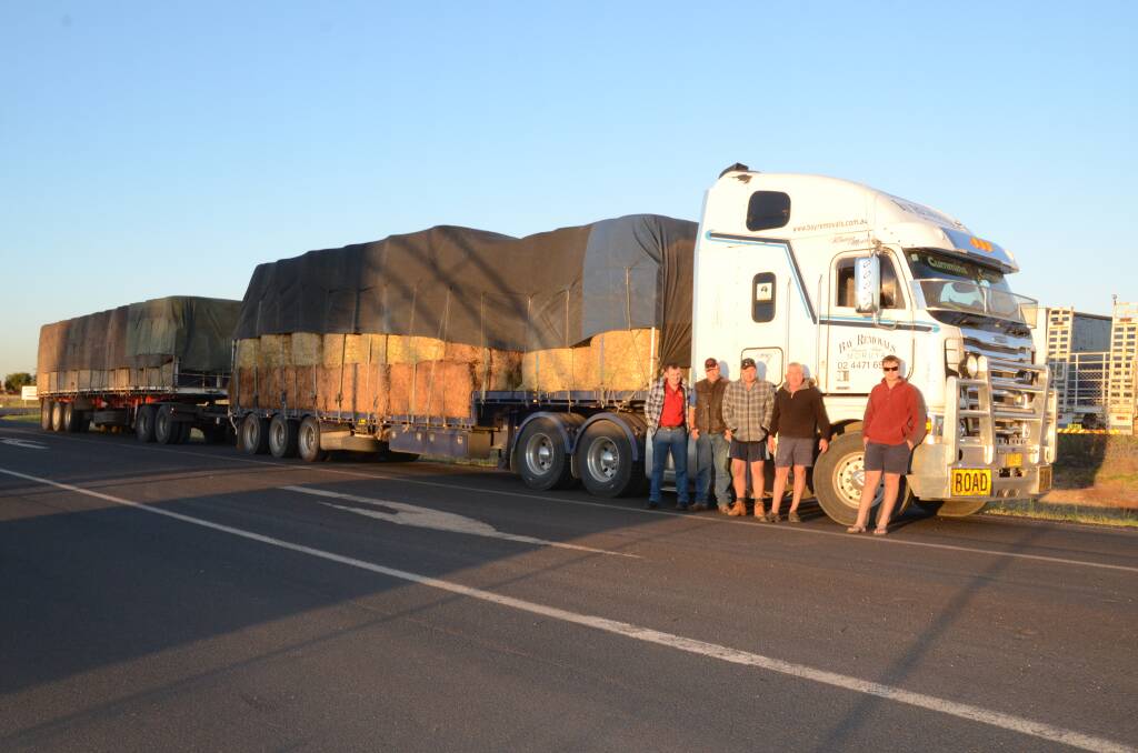 Bruce Reid along with Denny Reid, Dan Piggott, Ben Hill and Shane Roche, stopping at Rod Pillon Transport in Dubbo early on Thursday morning, before making their way to Ilfracombe in Queensland to drop off much-needed hay to drought-stricken farmers. 
	Photo: TAYLOR JURD