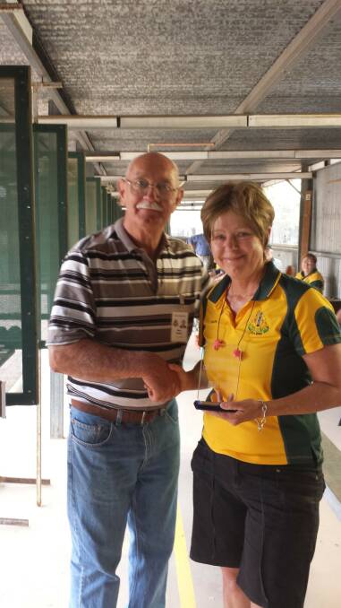 Dubbo Pistol Club president Max Fraser with Helen Lord.