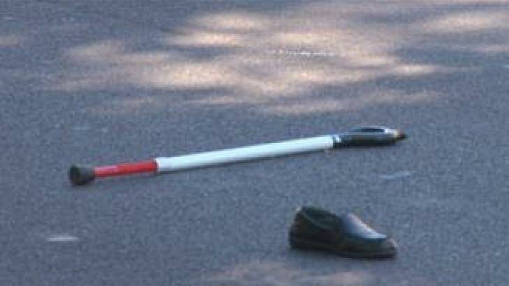 A walking stick and shoe at the scene. Photo: TNV News