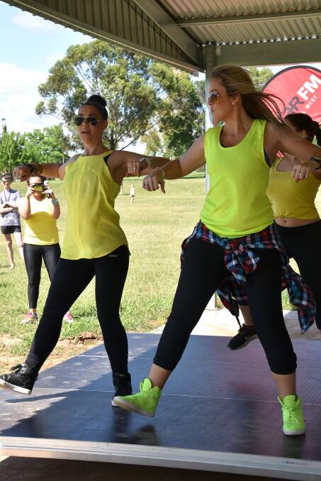 Tracy Hanna and Erin Fletcher lead a session of zumba at the Dance the Battle Together depression awareness event. 							       Photo: KATHRYN O'SULLIVAN