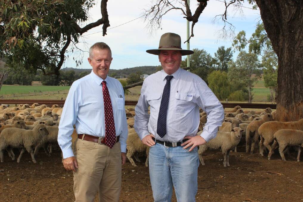 Mark Coulton and Barnaby Joyce announced funding for a virtual fencing trial through the CSIRO.  
Photo: CONTRIBUTED