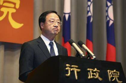 Taiwan's Premier Jiang Yi-huah announces he will step down after his ruling Nationalist Party was heavily defeated in local island-wide elections, Saturday, Nov. 29, 2014, at the Executive Yuan in Taipei, Taiwan. 