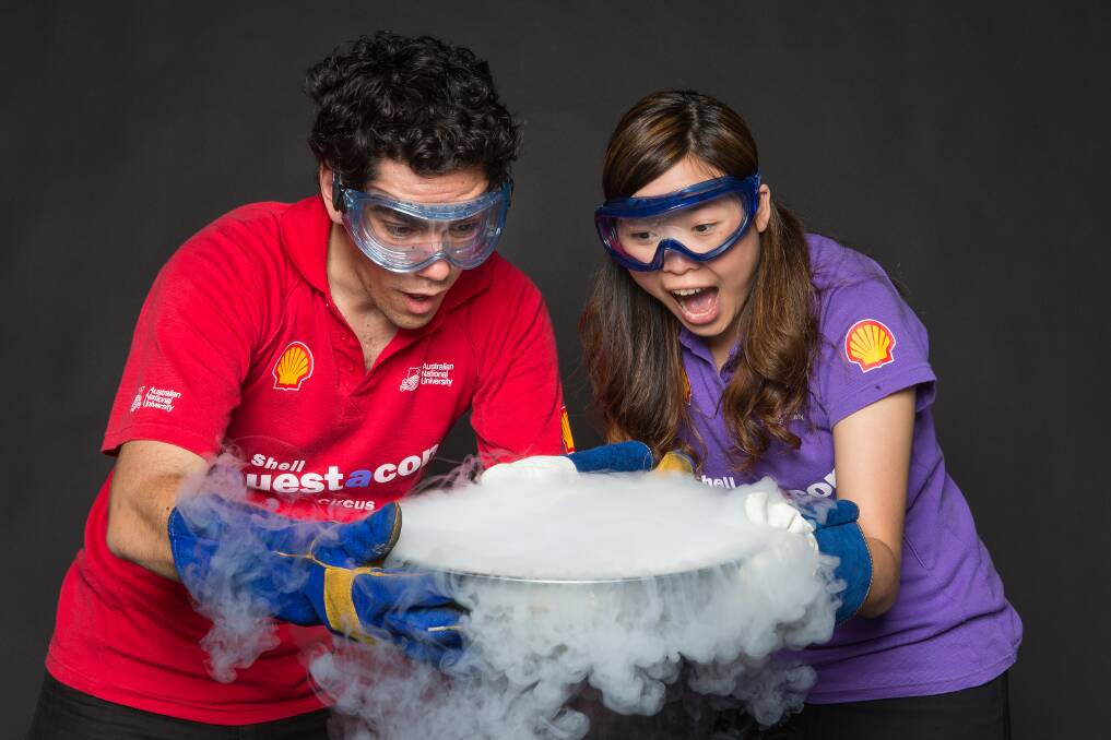 Shell Questacon Science Circus presenters Tom Carruthers and Jirana Boontanjai holding liquid nitrogen. 		   Photo: supplied
