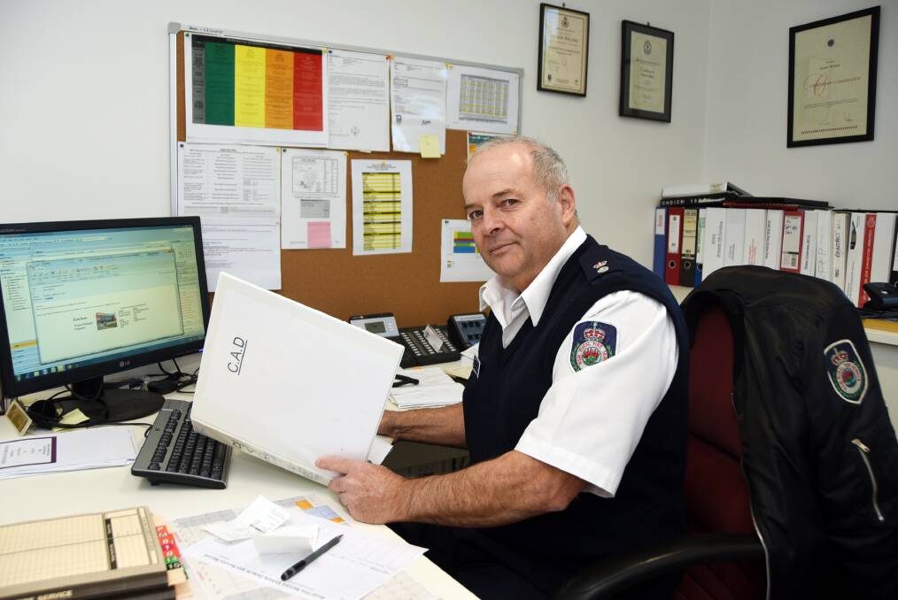 Superintendent Lyndon Wieland explains the new computer-aided dispatch (CAD) system that was rolled out to the Orana RFS region this week.  
Photo: BELINDA SOOLE