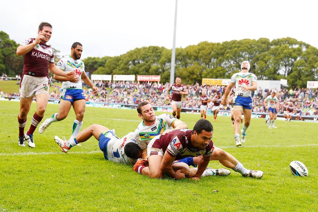 Peter Hiku scores for Manly during their clash with Canberra last season. The two sides could meet this year at Dubbo's Caltex Park. Photo: Getty Images