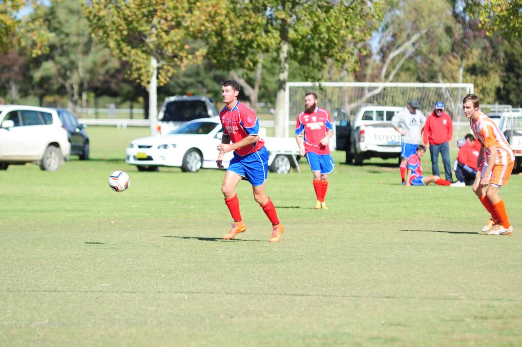 Adam Quill in action for Orana Spurs 1 during their loss to Dubbo FC 1. Photos: KATHRYN O'SULLIVAN