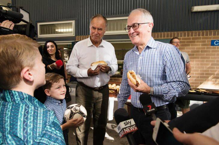 Bennelong by-election, 2017. Photograph shows Prime Minister Malcolm Turnbull with Liberal candidate John Alexander at Gladesville Public School polling booth. Saturday 16th December 2017. Photograph by James Brickwood. SMH NEWS 171216 fedpol