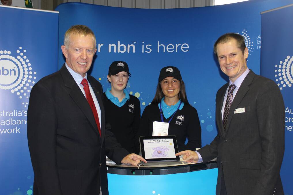 Parkes MP Mark Coulton and (right) Dubbo mayor Mathew Dickerson attend the nbn stand at the Dubbo Show on Saturday.	Photo: contributed