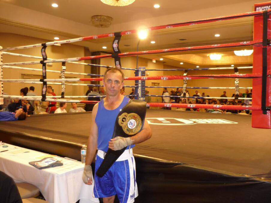 Dubbo's Gary Macfarlane, pictured in Kansas, shortly after winning the final bout in the World Masters Boxing Championships. 					    Photo: contributed