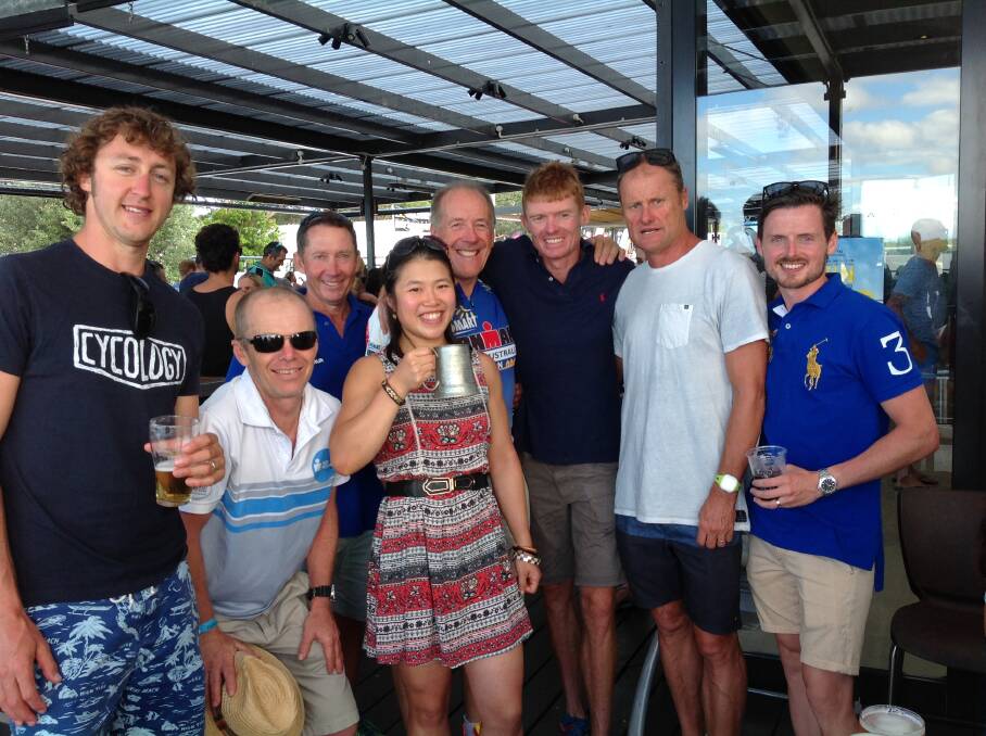 Dubbo triathletes Ed Druitt, Damien Kelly, Pete Christie, Ruby Kwong, Ian Crafter, Len Darlington, Rob Duffy and Lachlan Roach relaxing after competing at Huskisson. 											    Photo: CONTRIBUTED