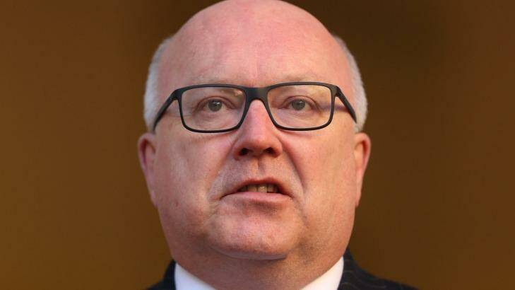 George Brandis says extra funding for mental health agencies is under consideration if a plebiscite goes ahead. Photo: Andrew Meares