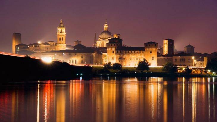 Cityscape of Mantua at night. Photo: Charles Bowman