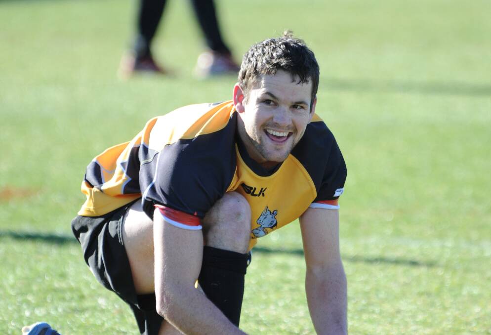 Kane Rich and his Rhino Gold teammates were all smiles on Saturday as they were victorious in the GrainCorp Cup grand final. 	Photo: LOUISE DONGES
