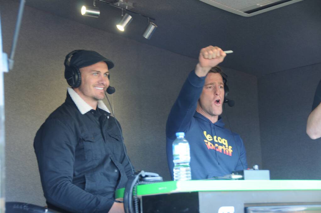 Matt Cooper and Brent Tate pump up the crowd with some State of Origin banter.