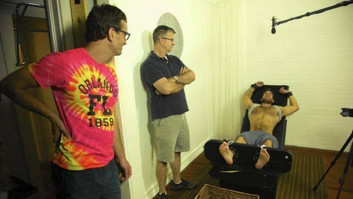 David Farrier, Richard Ivey and a tickle subject in<i>Tickled</i>. Photo: Theresa Ambrose