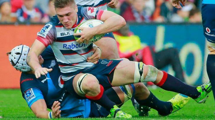 Keeping busy: Sean McMahon in action for the Rebels against the Bulls in June. Photo: Getty Images 