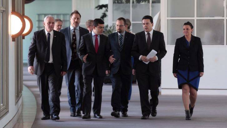 Jacqui Lambie and fellow senators gather at Parliament House to announce their move. Photo: Andrew Meares