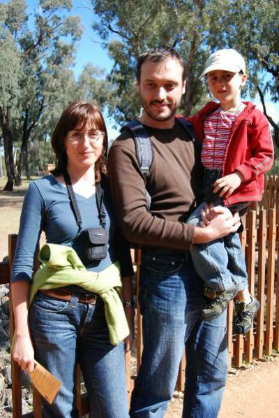Simeon and Vyara Malchev with their son Kalin, seeing the Western Plains Zoo’s giraffes for the first time.