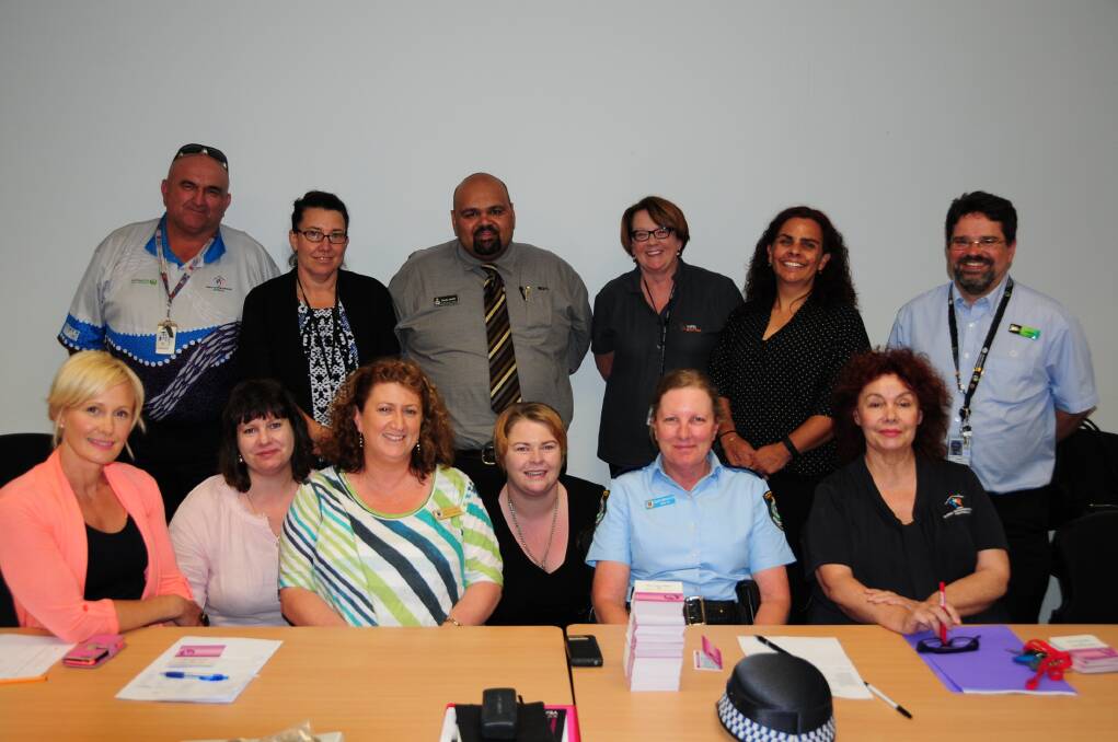 Helping to organise the Dubbo White Ribbon Forum were (sitting l-r) Dimity Chippendale, Narelle Jeffrey, Bec Camilleri, Raegan Brown, senior constable Wendy Manchester, Sue Buckley, (standing l-r) Jimmy Forrest, Melissa Clow, Kevin Jones, Donna Shadwell, Dale Bonham and Graeme Cheetham.  
Photo: CHARLIE WHITELEY