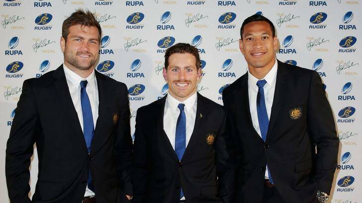 Israel Folau arrives at the John Eales Medal ceremony with Ben McCalman and  Bernard Foley.  Photo: Getty Images 