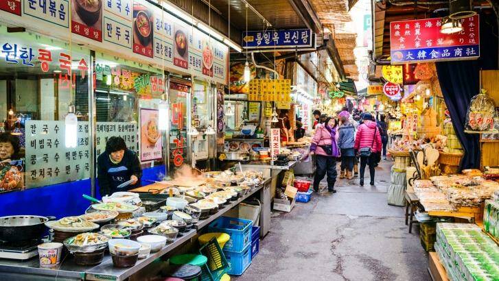 Shoppers pass through Dongdaemun Market.