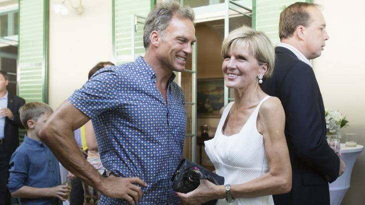 "Sixty is the new 40": Julie Bishop with her partner, David Panton, at a reception hosted by the Prime Minister for the Australian and Indian cricket teams at Kirribilli House on Thursday. She says older workers have a great deal to offer in skills and experience. Photo: James Brickwood