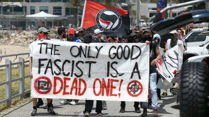 Members of the anti-fascist Antifa group at Cronulla on Saturday. Photo: Alex Ellinghausen
