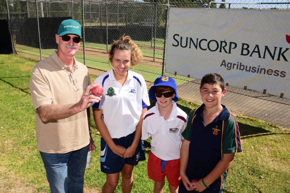 Former Australian opening bowler Dennis Lillee with young Dubbo bowlers Emma Hughes, Lawson Shepherd and Preston Beauchamp on Wednesday. 	Photo: BELINDA SOOLE