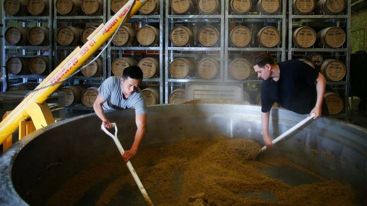 Handmade: Jonathan Liu and Dave Withers at work at Archie Rose Distilling Co. Photo: Daniel Munoz