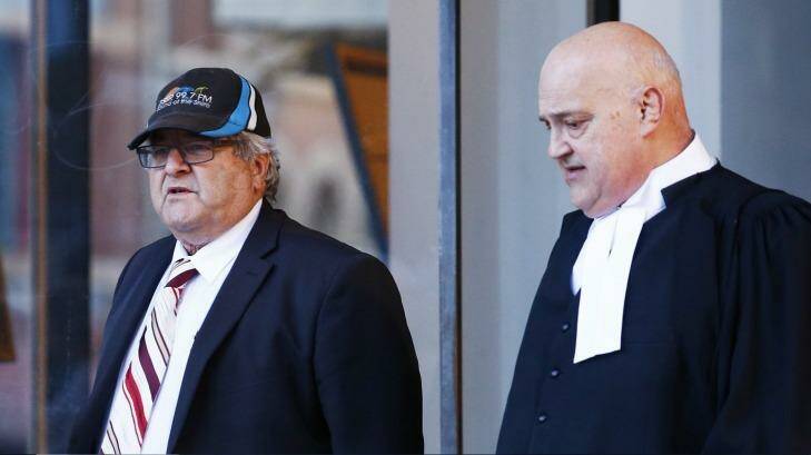 Neil Albert Futcher (left) and his lawyer John Galluzo leaving court on Tuesday. Photo: Daniel Munoz