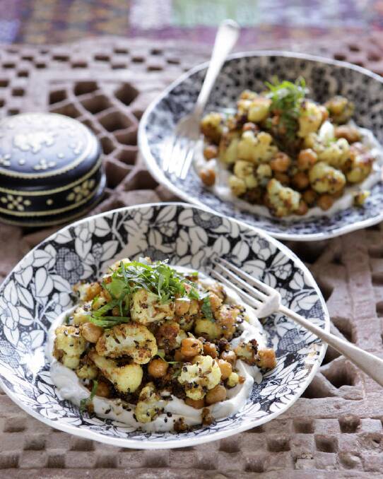 Spicy cauliflower and chickpeas with minted yoghurt <a href="http://www.goodfood.com.au/good-food/cook/recipe/spicy-cauliflower-and-chickpeas-with-minted-yoghurt-20111019-29uiv.html"><b>(RECIPE HERE).</b></a> Photo: Marina Oliphant