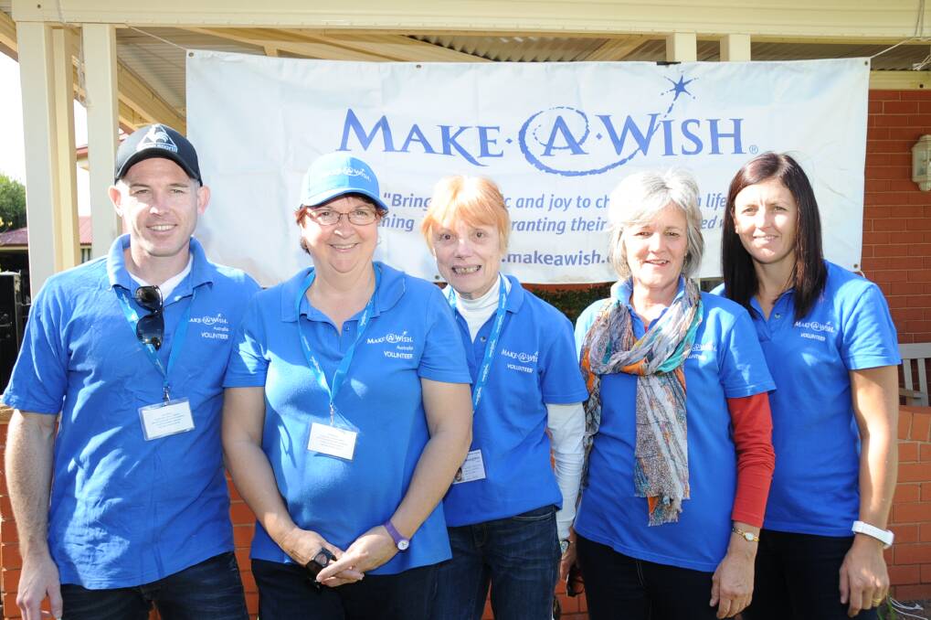 Make-A-Wish volunteers Luke O'Neill, Karen McMullen, Gai Manusu, Lyn Allen and Janelle Toshack. Photo: KATHRYN O'SULLIVAN
