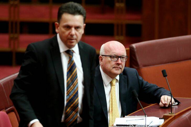 SenatorNick Xenophon and Attorney-General Senator George Brandis in the Senate at Parliament House in Canberra on Monday 4 September 2017. Fedpol Photo: Alex Ellinghausen