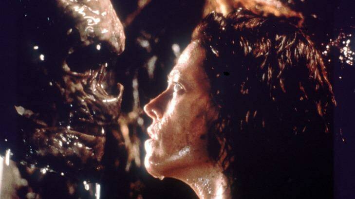 Sigourney Weaver and alien.