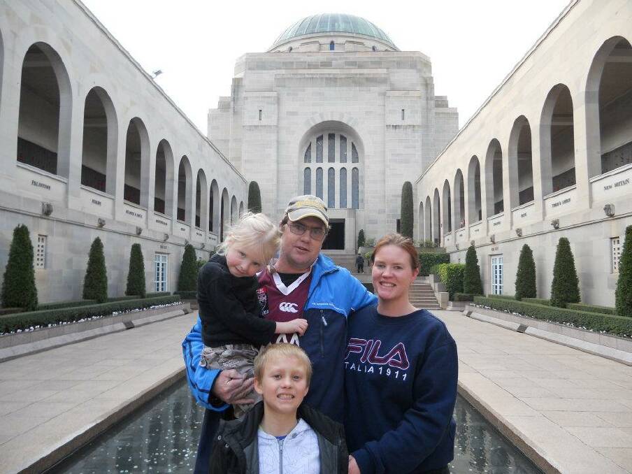 Jason Kidman, with his partner Alysha Heywood and children Joshua and Alanah.                                           Photo: CONTRIBUTED