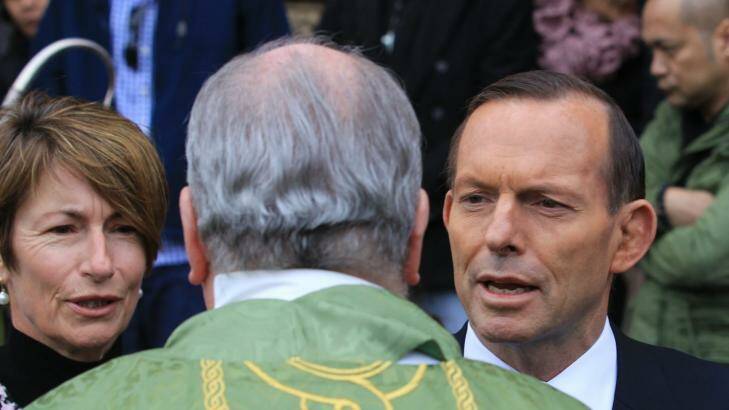 Prime Minister Tony Abbott and his wife Margie at Sunday's service. Photo: James Alcock