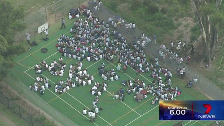 Bomb threat: Pupils from Penrith High School are evacuated. Photo: Channel Seven