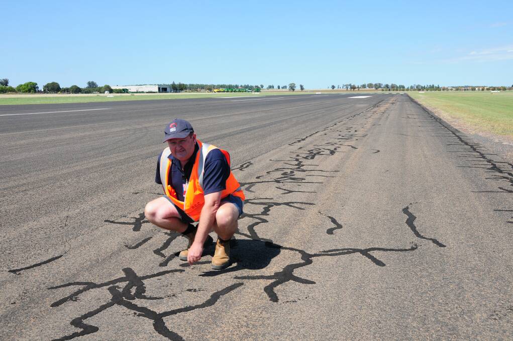 Dubbo City Regional Airport operations manager Lindsay Mason on the runway that will undergo resurfacing later this month. 								        Photo: HANNAH SOOLE