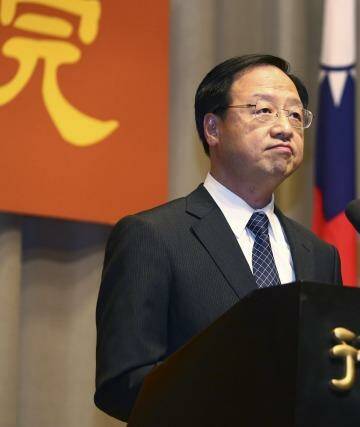 Taiwan's Premier Jiang Yi-huah announces he will step down after his ruling Nationalist Party was heavily defeated in local island-wide elections, Saturday, Nov. 29, 2014, at the Executive Yuan in Taipei, Taiwan. 