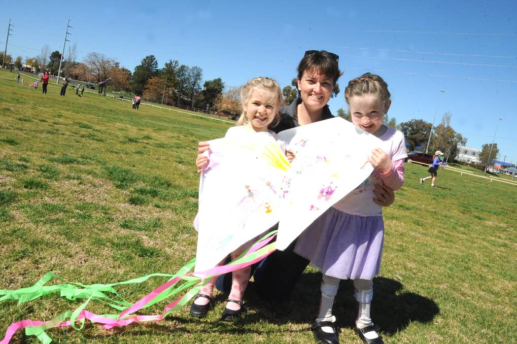 Having a great time at the Kites for Kids event on Sunday was Juliet , Fiona and Eliza Quinn.		   		   
Photo: KATHRYN O'SULLIVAN