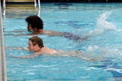 Henry Speight (top) and David Pocock, swimming as part of their rehabilitation. Photo: Graham Tidy